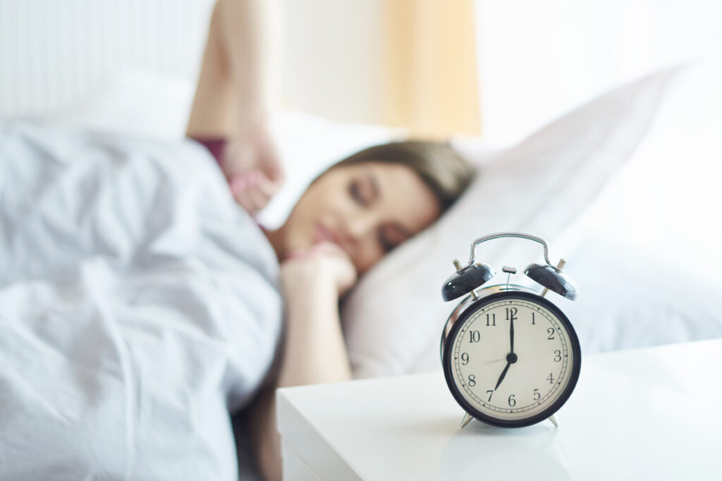 young woman waking up